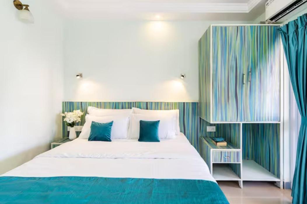 Serene Escape: Beachside 1BHK with Pool & Garden Views Colva Exterior photo